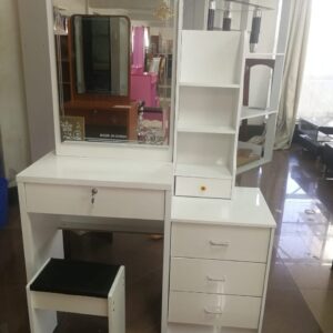 Dressing table with sliding mirror